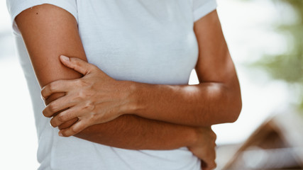 Wall Mural - Woman with pain in shoulder and upper arm , Health Care Concept