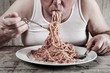 © soupstock - Man eating spaghetti, overeating adult.