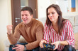 © Aleksei Lazukov - young man won the video game his girlfriend