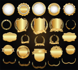 Wall Mural - Golden shields laurel wreaths and badges vector collection