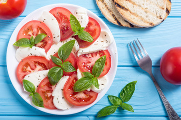 Wall Mural - Caprese salad with mozzarella