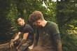 © Wavebreak Media - Fit men relaxing over obstacle course