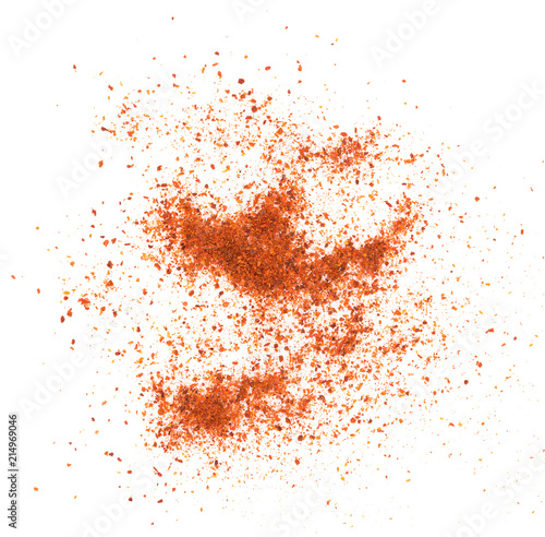 Fotografía Pile of red paprika powder on white background