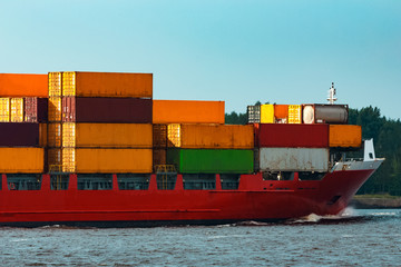 Wall Mural - Red container ship underway