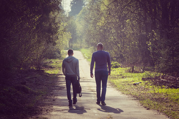 Two friends on walk, big and small concept