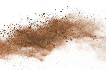 Wall Mural - brown powder explosion isolated on white background.