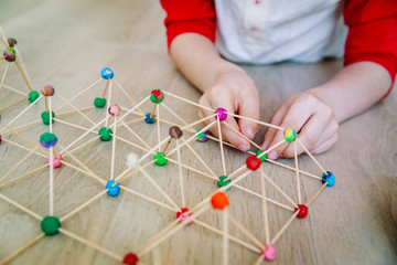 Wall Mural - child making geometric shapes, engineering and STEM