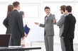 © ASDF - business team prepares for the presentation of the new project