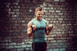 © zamuruev - Fitness man exercising with stretching band. Muscular sports man exercising with elastic rubber band. Guy working out with rubber band. Fit, fitness, exercise, workout and healthy lifestyle