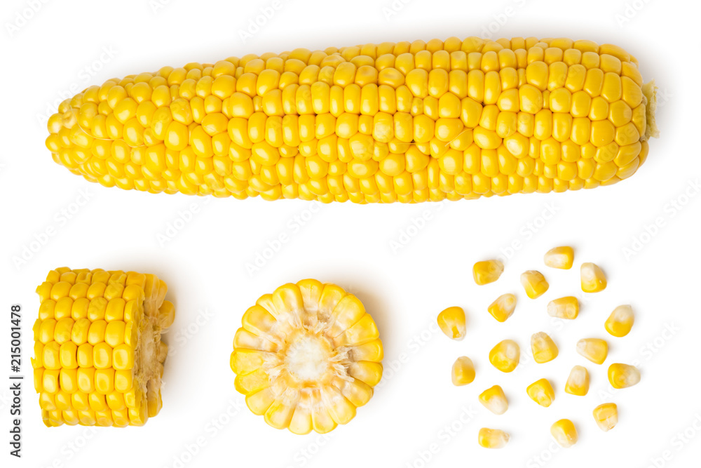 The peeled ear of corn, a piece of and seeds on a white, isolated. The view from the top. - obrazy, fototapety, plakaty 