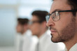 © ASDF - close up.businessman on the background of colleagues