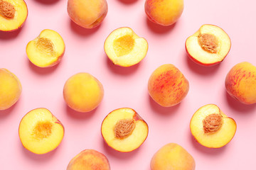 flat lay composition with ripe peaches on color background