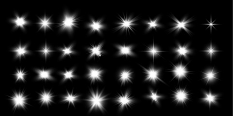Wall Mural - set of glowing lights effects isolated on black background. glow light effect. star burst with spark