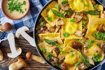 Wall Mural - homemade ravioli in garlic mushrooms sauce