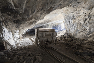 Wall Mural - Mining trolley in a tunnel of an abandoned lime mine in Switzerland