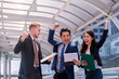 © A Stockphoto - Business People Success Team Celebration Concept teamwork Hands raise.