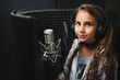 little girl singing in recording studio