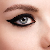 Fototapeta Panele - Beauty makeup for blue eyes. Part of beautiful face closeup. Perfect skin, long eyelashes. Make up concept.