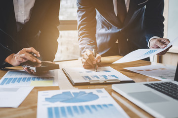 Fototapete - Executive team discussing the charts and graphs working in business strategy and financial plan to investment profit, discussing working analysis with financial data and marketing growth report