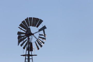 An old fashioned farm windmill