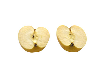 Ripe, yellow Apple cut into two halves. On white background