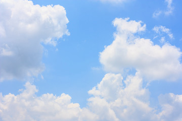 fluffy cloud against blue sky background