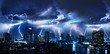 canvas print picture - Lightning storm over city in blue light