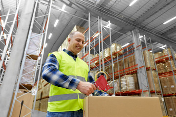 Poster - logistic business, shipment and people concept - worker in safety vest packing parcel box with scotch tape at warehouse or mail storage