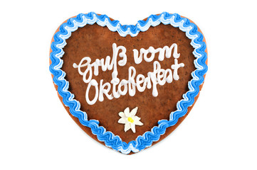 Wall Mural - Oktoberfest Gingerbread heart with german words greetings from Oktoberfest on white with copy space isolated background.