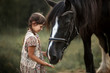 Little girl with shire horse