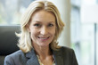 © PhotoAlto - Close-up of businesswoman smiling