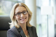 © PhotoAlto - Close-up of businesswoman smiling
