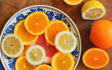 Citrus Fruit Slices On Plate