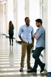 © seanlockephotography - Workspace: Work Friends Having Discussion In Hallway