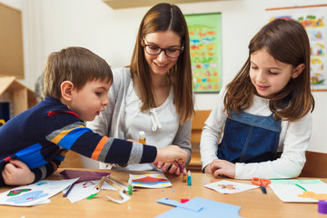 Preschool Teacher with Children at Kindergarten - Creative Art Class