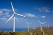 © Neal Pritchard/Stocksy - Massive Wind Power Turbines On Coast