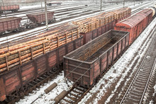 Freight Wagons With Logs And Empty Wagons