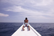 © Oscar Parasiego/Stocksy - Young boat captain looking to the horizon