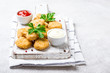 Fried crispy chicken nuggets with popular sauces