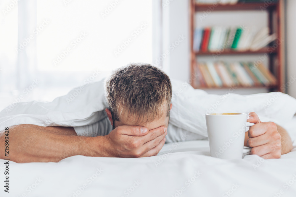 Man trying to wake up in the morning - obrazy, fototapety, plakaty 