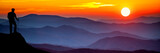 Fototapeta Góry - silhouette Of Hiker Watching Sunset Over Mountains