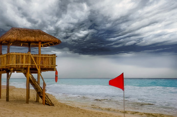 Canvas Print - Red Flag and Lifeguard Station