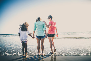 Wall Mural - Lebians mothers with adopted daughter