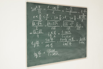 Wall Mural - Mathematics formulas written on the chalkboard. School, lesson, education.