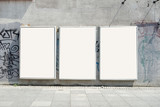Fototapeta  - Thee empty advertising billboards on the wall of building