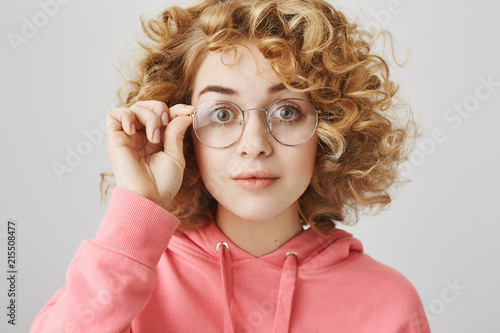 Charismatic Girl Tries On New Pair Of Glasses Portrait Of Cute