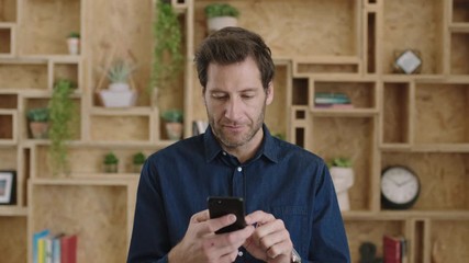 portrait of professional start up businessman messaging using smartphone networking