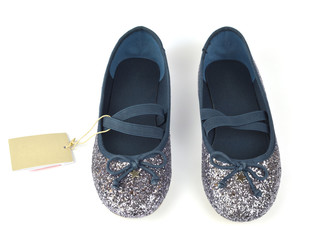 Shimmer silver blue ballerina flat shoes with crossed elastic drawstrings and a price tag on white