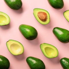 Wall Mural - avocado pattern on pink background. top view. banner. pop art design, creative summer food concept. 