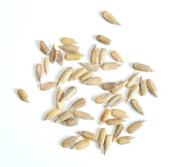 Wall Mural - Sunflower seeds, peeled on white background